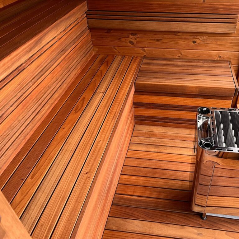 Sauna Zoria Elite 220x400 cm z termodrewna w ogrodzie - nowoczesny model z przeszklonymi drzwiami i przestronnym wnętrzem